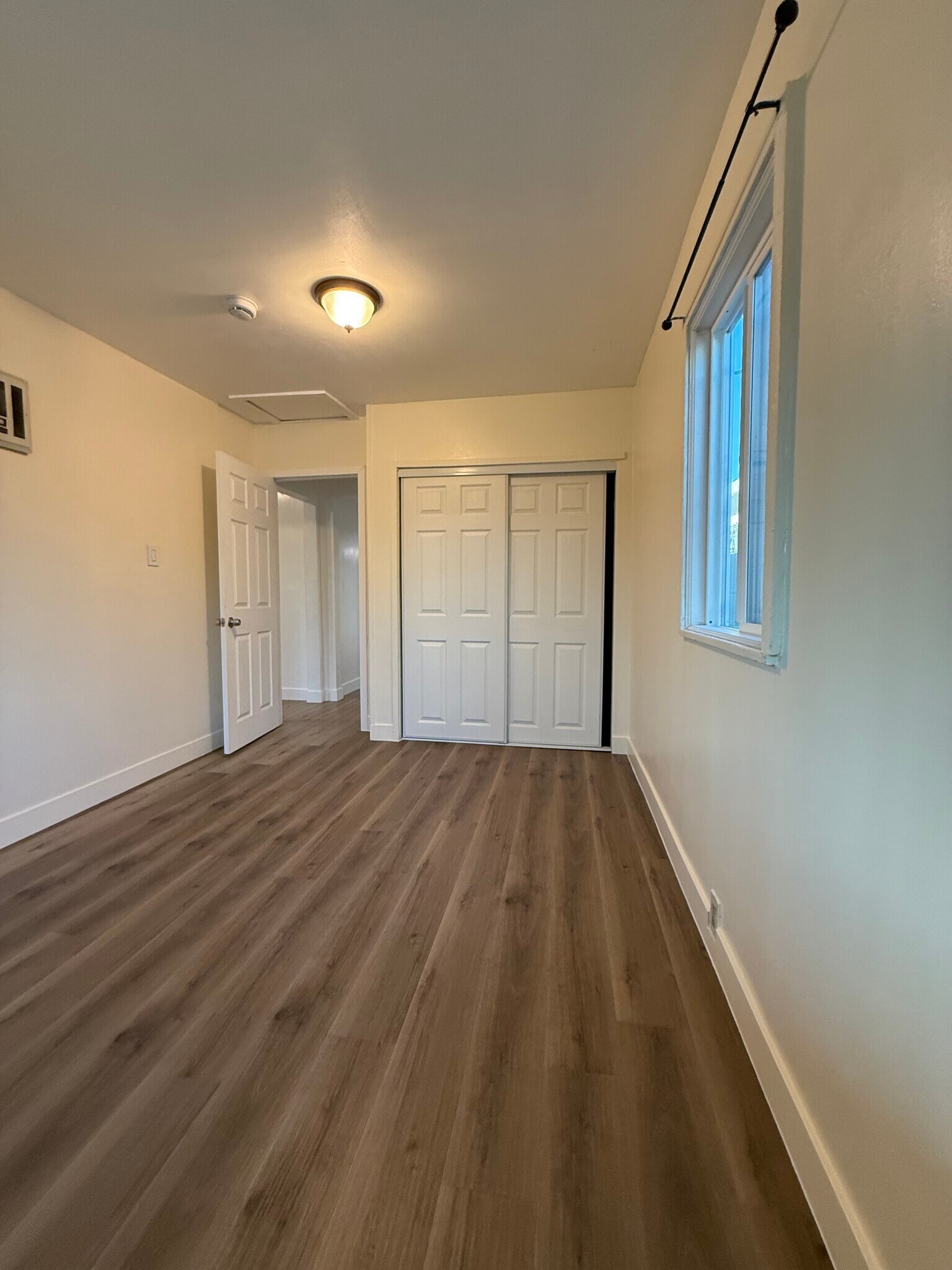 Bedroom with view of closet - 1437 W 60th Pl