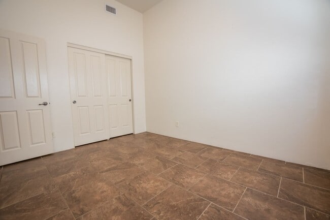 Building Photo - Gorgeous 3 Bedroom 2 Bathroom Home with Tile Throughout! Central A/C, 2 Car Garage!