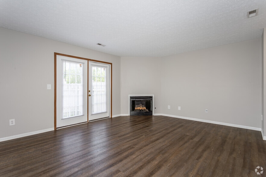 3BR, 2BA - 1,300SF - Garden - Living Room - Millstone Lakes Apartments
