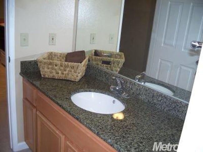 Building Photo - Lower-Level Condo in Gated Timberlake, The...