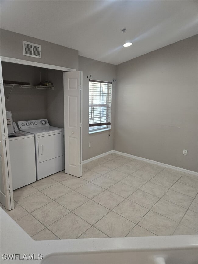 Building Photo - 10344 Whispering Palms Dr