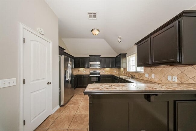 Building Photo - 9423 Peachtree Ln