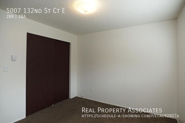 Building Photo - Spacious Two Bedroom Duplex Home with an A...