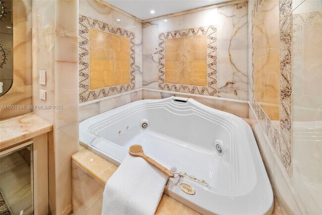 Building Photo - 7471 Fisher Island Dr