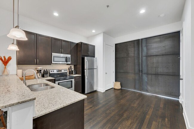 Building Photo - Furnished West End Luxury Condo