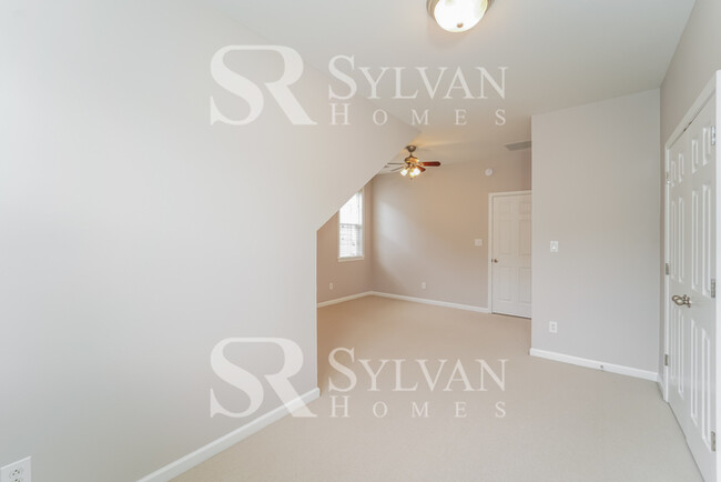 Building Photo - Welcome to this charming abode.