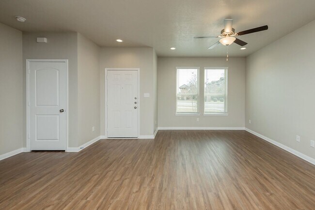 Building Photo - Live, love, and grow in this charming townhome!
