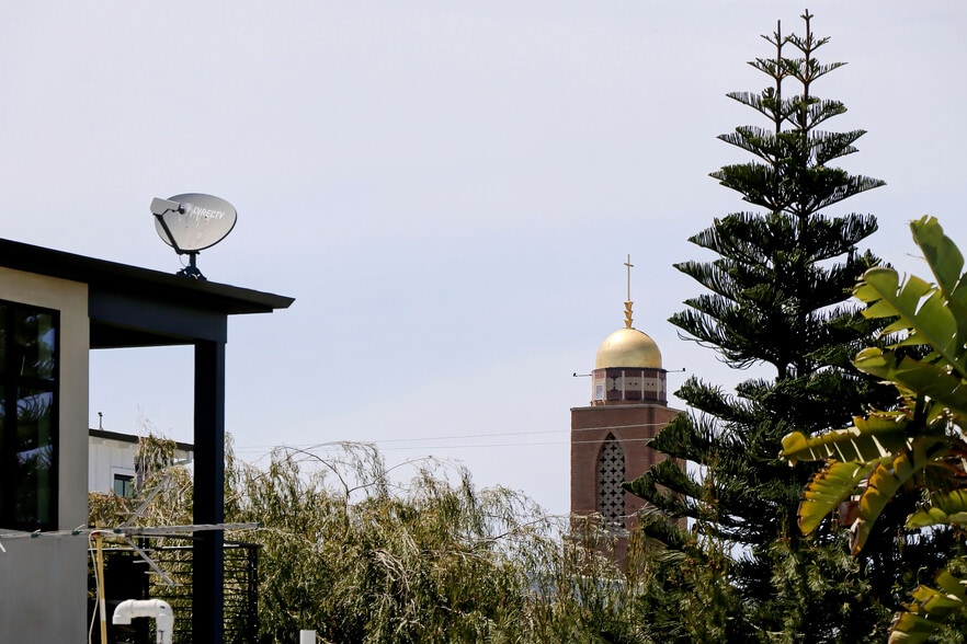Oversized sliding windows open to a great view of American Martyrs Church. - 744 12th St