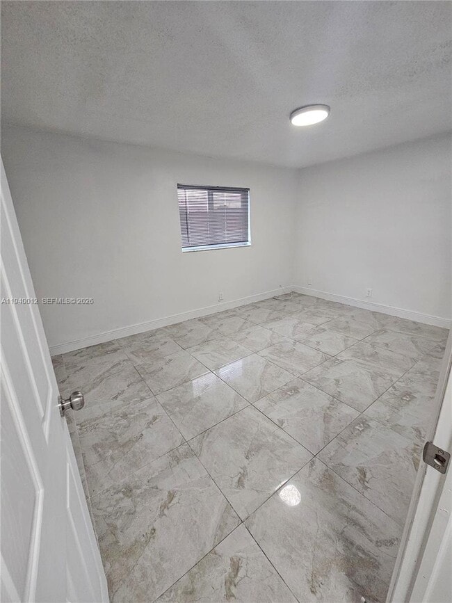 Building Photo - 5615 NW 27th Ct