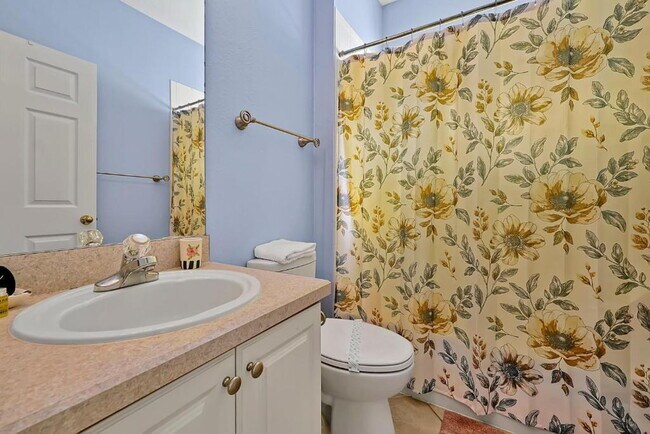 Building Photo - "Stunning 3BR Orlando Home with Private Screened Pool, Spa & Spacious Living Areas"