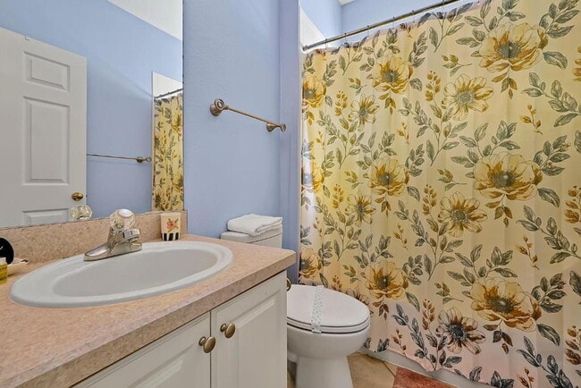 Building Photo - "Stunning Fully Furnished 3BR Orlando Home with Private Screened Pool, Spa & Spacious Living Areas"