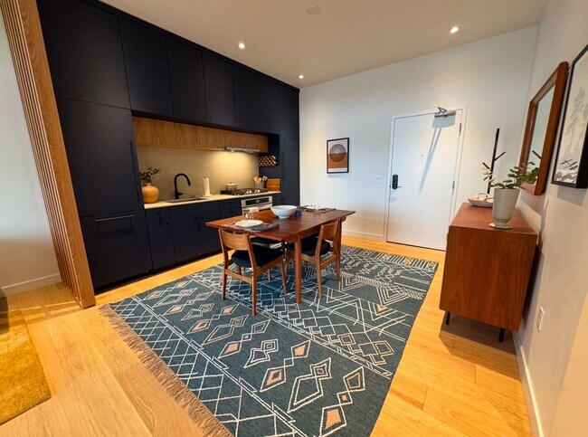 Building Photo - FURNISHED: UTILITIES PAID BY OWNER: (TWO MONTH MOVE-IN RATE OPTION) NWX tastefully furnished 1 be...