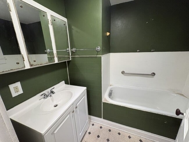 Building Photo - Updated West Akron Home with Flexible Living Space, Large Yard & Garage