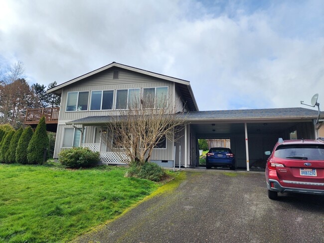 1 covered parking spot - 806 96th Ave NE