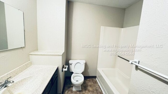 Building Photo - Corner Townhome with a Bedroom Balcony Overlooking Lake Tapawingo