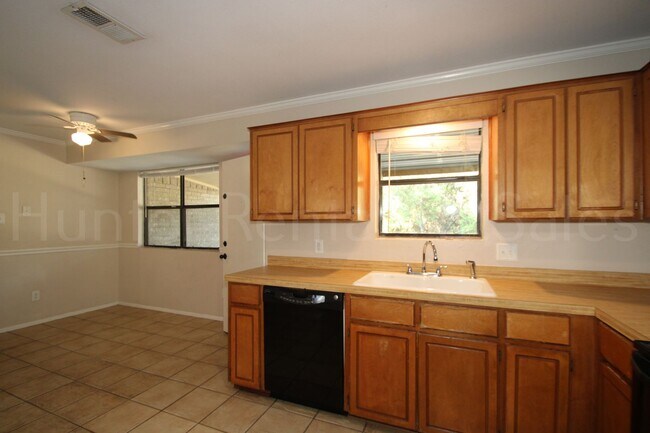 Building Photo - Spacious 4-Bedroom Home with Bonus Room, Large Yard & Solar Panels