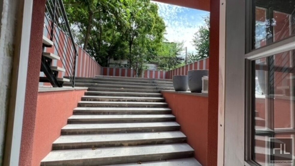 Building Photo - 100% GUT RENOVATED DUPLEX  with PRIVATE GA...