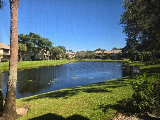 Building Photo - 4599 Carambola Cir S