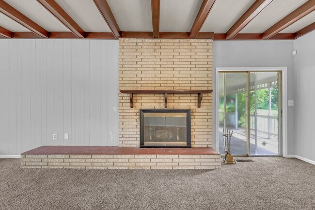 Building Photo - spacious 4-bedroom, 2.5-bath home featuring a 2-car garage and fresh updates throughout.