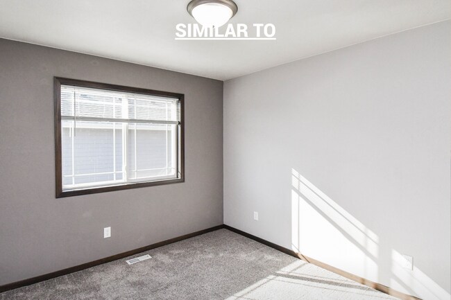 Building Photo - East Sioux Falls 4-Bedroom Townhome – Style, Space & Convenience!