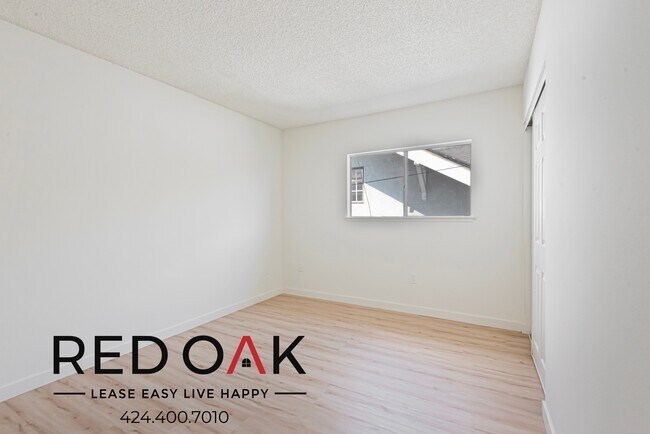 Building Photo - 1341 W 37th Pl