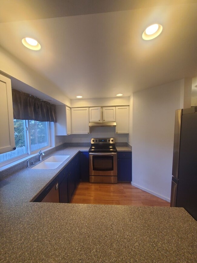 Building Photo - Your Peaceful Retreat in the Heart of Conv...