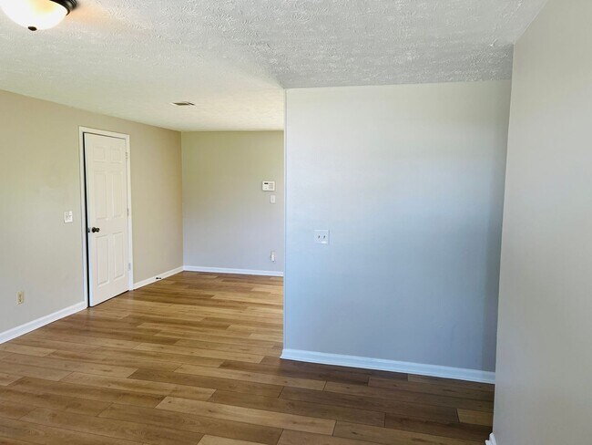 Building Photo - Wow! Check out this charming 4-bedroom, 1-...