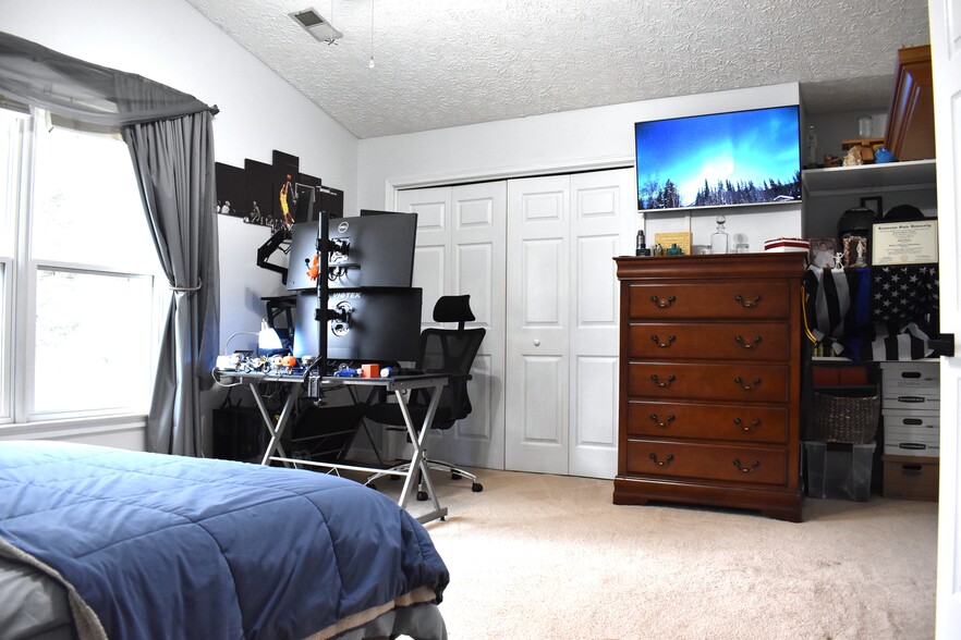 Guest Bedroom 1 (Queen) TV - 2103 Chatou Pl NW