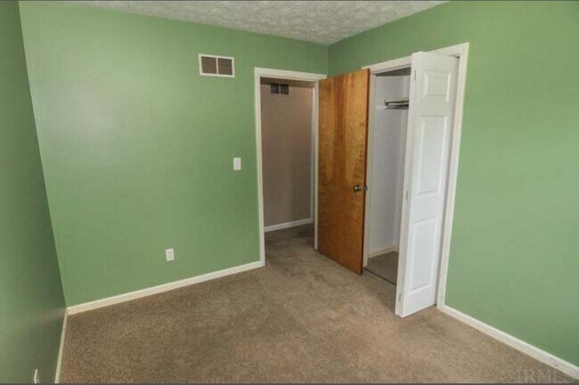Building Photo - Beautiful 4-Bedroom Home on Spacious Corne...
