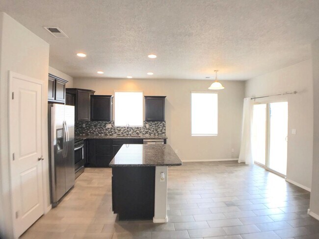 Building Photo - Spacious 3BR/2BA Los Lunas Home with Open Layout, Office Space & Refrigerated Air