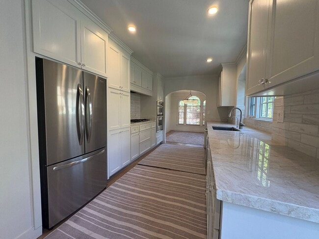 Building Photo - Mediterranean Bungalow in Community Center...