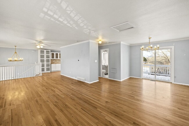 Building Photo - Spacious Split-Level Home with Beautiful Kitchen, Large Deck, and Fully Fenced Yard