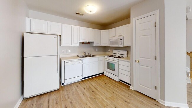 Building Photo - Townhome | Hard Surface Floors Through-Out...