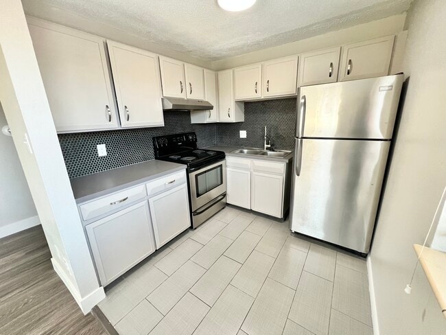 Experience the elegance of this contemporary kitchen, designed for modern living. - Wadsworth Station West