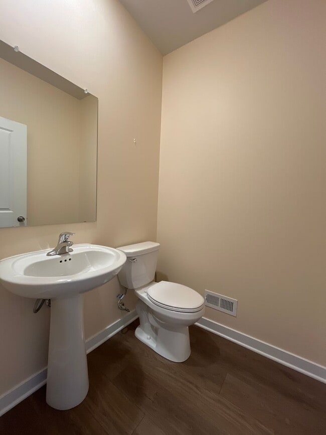 Building Photo - Move-in-ready Brookside Court townhome off...