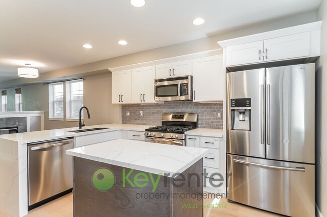 Primary Photo - **Rent Special** Modern 3 Bedroom with Off...