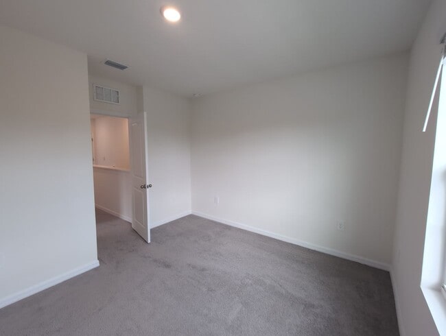 Building Photo - Fresh new build ~ 3 bed/ 2.5 bath Townhous...