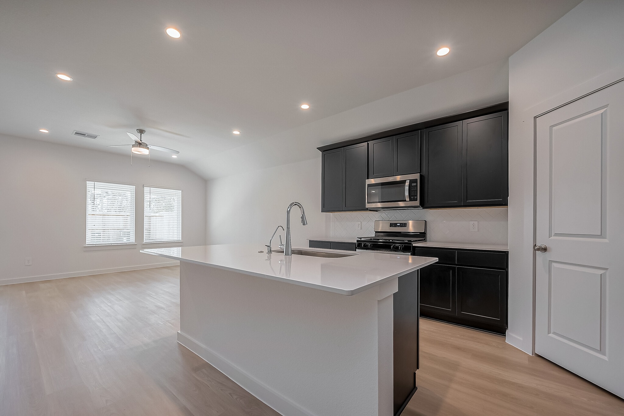 Gourmet Kitchen with open-concept living - 1535 Merulana Ln