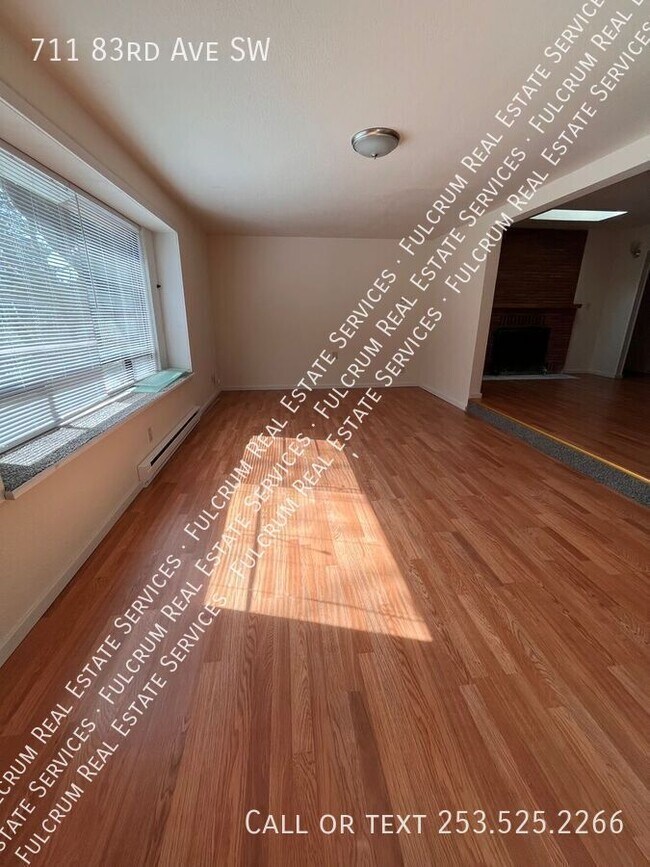 Building Photo - 711 83rd Ave SW