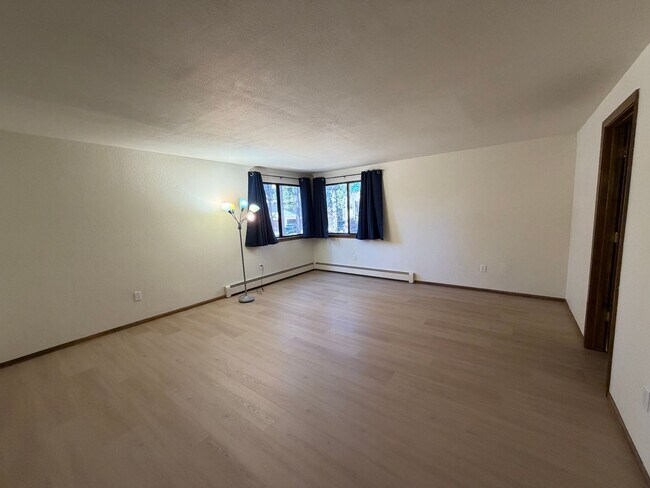 Building Photo - Tri-Level Lake Village Condo with Upgrades