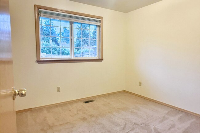 Building Photo - Sunny Rambler on Corner Lot with Large Fenced Yard & Deck