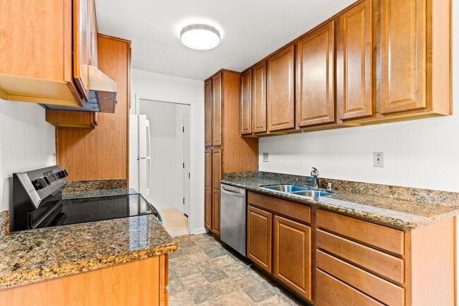 Building Photo - Modern 2-Bedroom Condo with Pool and Koi Pond Views