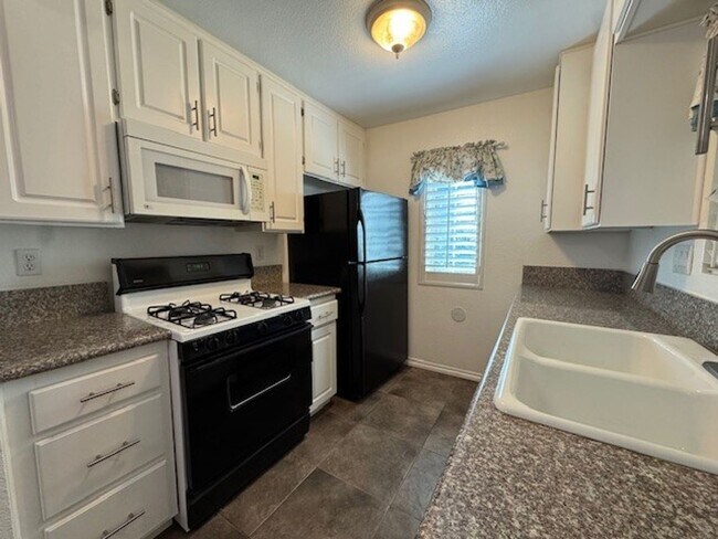 Building Photo - Beautiful & Private Condo in the Sought-After Terra Vista Community