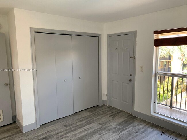 Building Photo - 241 S Royal Poinciana Blvd