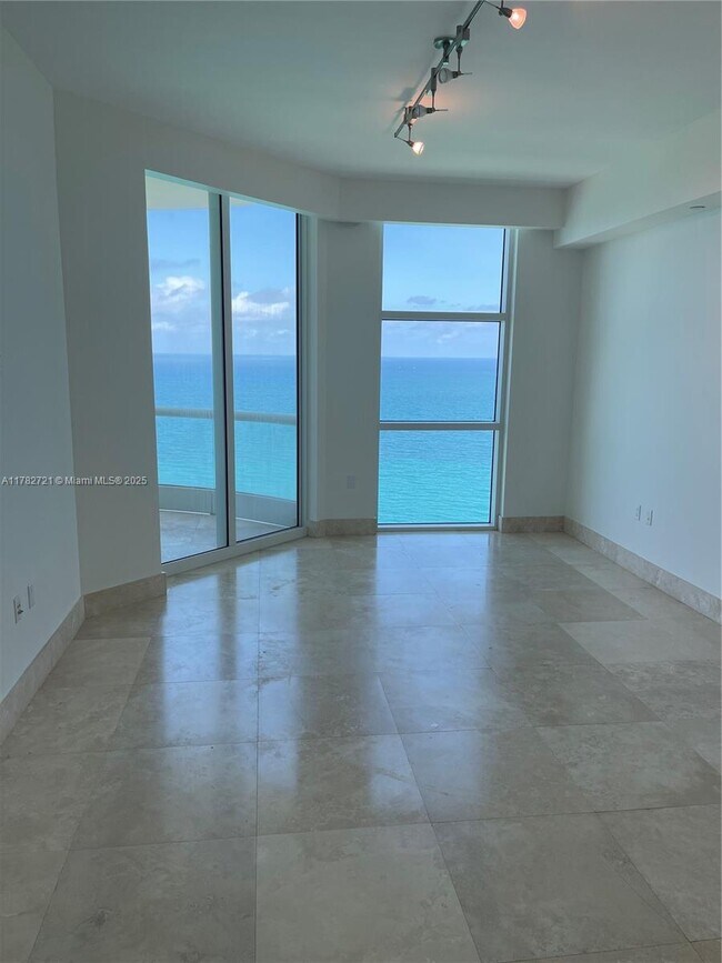Building Photo - 16047 Collins Ave