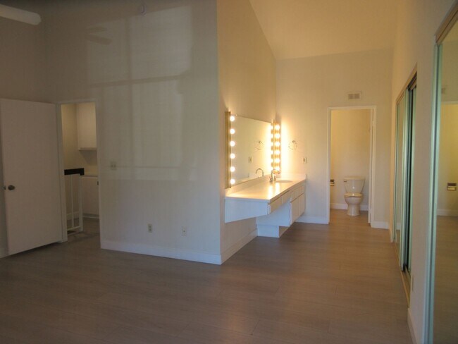 Building Photo - Duggan Property Management, Inc presents this 3BR +2.5 bath in Encino Village Townhomes