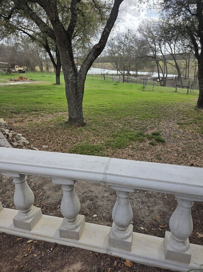 Building Photo - Custom built condo! Country Living! Offered unfurnished OR furnished!