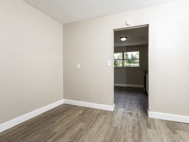 Building Photo - 3 BR/1BA | Newly Renovated Single Family Home | Screened in Patio and carpot | Huge backyard!