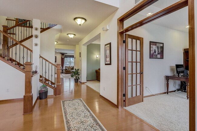 Building Photo - Grand 5 bed 4.5 bath Maple Grove Home w/ 3-Car Garage! Fully Furnished