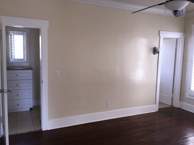 bedroom facing closet and bathroom - 261 Parke St